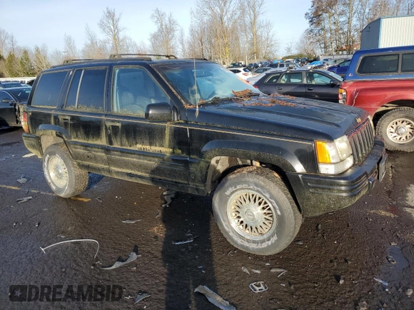 1998 Jeep Grand Cherokee Limited with VIN 1J4GZ78S0WC138917, listed as a Copart auction lot 86223974 with 152,482 mi miles and Clean title. Bid and sale history available at DreamBid. Image 4.