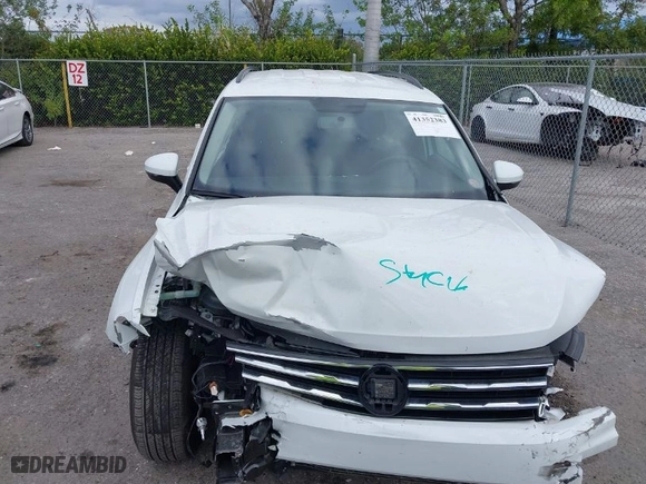 2021 Volkswagen Tiguan S with VIN 3VV1B7AX9MM119690, listed as a IAAI auction lot 41352383 with 27,149 mi miles. Bid and sale history available at carsss.com. Image 12.