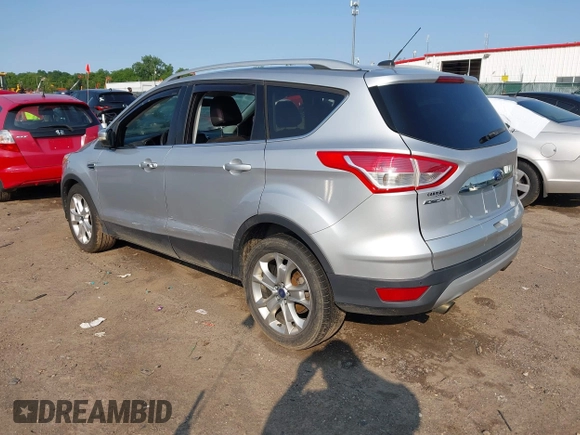 2015 Ford Escape Titanium z VIN 1FMCU0J90FUC02039, wystawiony jako IAAI lot #42369882 z przebiegiem 156 287 mil mil oraz . Historia ofert i sprzedaży dostępna na DreamBid. Obrazek 3.