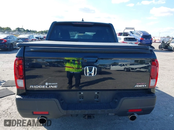 2022 Honda Ridgeline Sport with VIN 5FPYK3F15NB014541, listed as a IAAI auction lot 41514422 with 34,954 mi miles and . Bid and sale history available at DreamBid. Image 16.