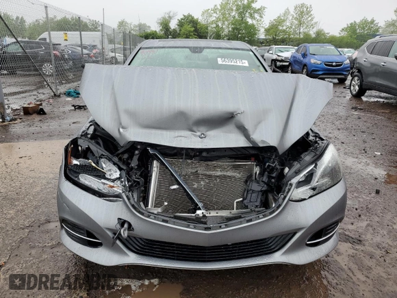 2014 Mercedes-Benz E 350 Luxury with VIN WDDHF8JB1EB014135, listed as a Copart auction lot 56395215 with Not provided miles and Salvage title. Bid and sale history available at DreamBid. Image 5.
