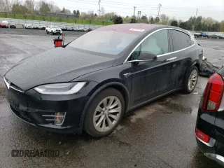 2018 Tesla Model X 75D with VIN 5YJXCBE20JF119875, listed as a Copart auction lot 50772175 with 48,805 mi miles and Salvage Title. Bid and sale history available at carsss.com. Image 1.