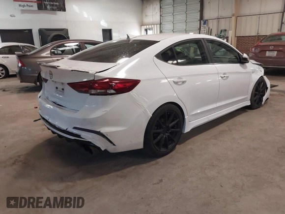 2018 Hyundai Elantra Sport с VIN KMHD04LB9JU505885, выставлен на аукционе IAAI как лот 41350693 с пробегом 155 153 миль миль и . История ставок и продаж доступна на DreamBid. Изображение 4.