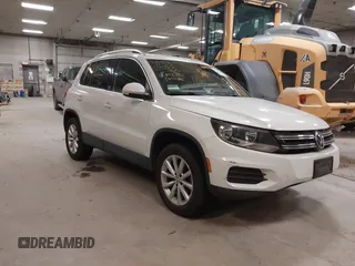 2017 Volkswagen Tiguan Wolfsburg Edition with VIN WVGRV7AX3HK000874, listed as a IAAI auction lot 41332583 with 27,921 mi miles and . Bid and sale history available at DreamBid. Image 1.