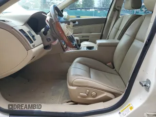 2007 Cadillac STS z VIN 1G6DW677670117293, wystawiony jako Copart lot #57677065 z przebiegiem 95 907 mil mil oraz Szkoda całkowita • Salvage title. Historia ofert i sprzedaży dostępna na DreamBid. Obrazek 7.