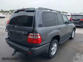 2004 Toyota Land Cruiser with VIN JTEHT05JX42059414, listed as a IAAI auction lot 41919791 with 210,528 mi miles. Bid and sale history available at carsss.com. Image 4.
