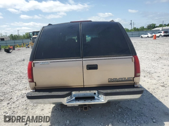 1999 Chevrolet Suburban with VIN 3GNEC16R6XG205408, listed as a Copart auction lot 57169415 with 303,412 mi miles and Salvage title. Bid and sale history available at DreamBid. Image 6.