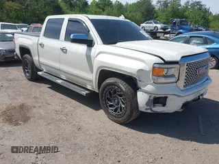 2015 GMC Sierra 1500 Denali with VIN 3GTU2WEJ7FG460695, listed as a IAAI auction lot 42023393 with 116,761 mi miles and . Bid and sale history available at DreamBid. Image 1.