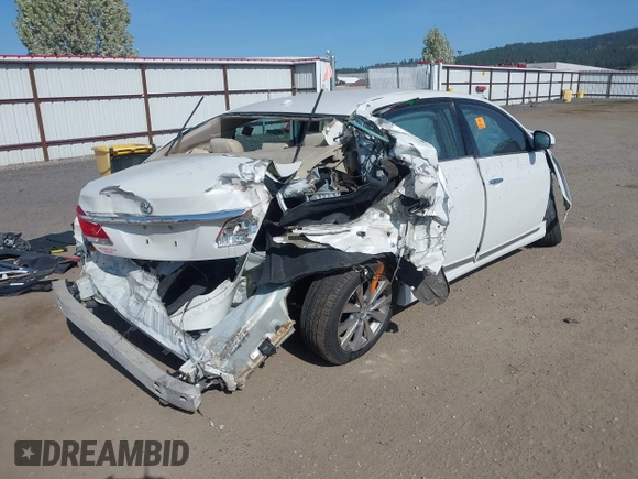 2011 Toyota Avalon with VIN 4T1BK3DB2BU371961, listed as a IAAI auction lot 42113686 with 135,218 mi miles and . Bid and sale history available at carsss.com. Image 4.