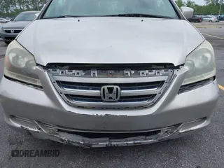 2007 Honda Odyssey EX-L z VIN 5FNRL38647B426620, wystawiony jako IAAI lot #42059093 z przebiegiem 258 622 mil mil oraz . Historia ofert i sprzedaży dostępna na DreamBid. Obrazek 6.
