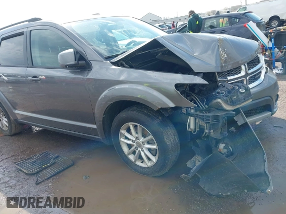2013 Dodge Journey SXT with VIN 3C4PDCBG6DT506486, listed as a IAAI auction lot 41877271 with 196,597 mi miles and . Bid and sale history available at carsss.com. Image 1.