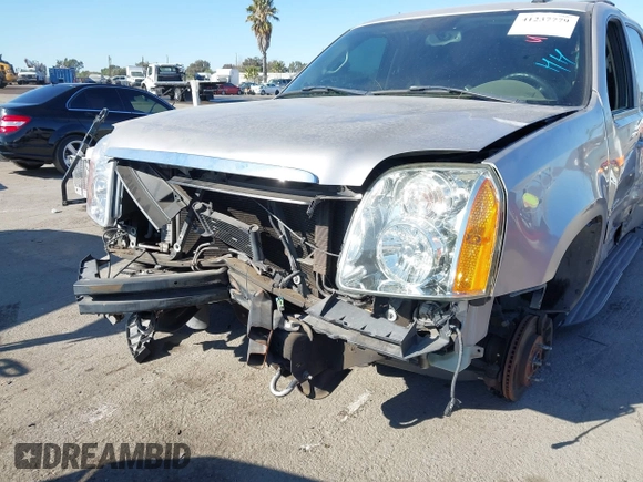 2007 GMC Yukon SLE with VIN 1GKFK130X7J131757, listed as a IAAI auction lot 41237779 with 156,148 mi miles. Bid and sale history available at carsss.com. Image 6.