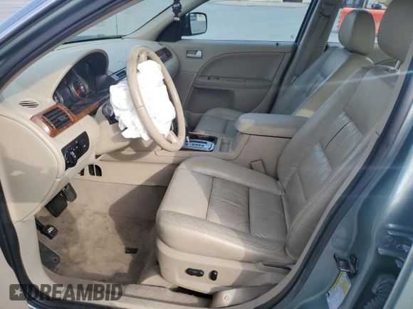 2006 Ford Five Hundred SEL с VIN 1FAFP24116G131870, выставлен на аукционе Copart как лот 53336385 с пробегом Не указан миль и Списание • Salvage title. История ставок и продаж доступна на DreamBid. Изображение 7.