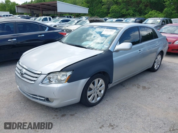2006 Toyota Avalon XL with VIN 4T1BK36B86U127735, listed as a IAAI auction lot 42112001 with 173,861 mi miles. Bid and sale history available at carsss.com. Image 2.