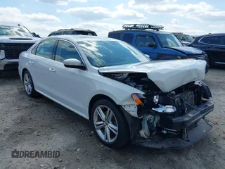 2014 Volkswagen Passat SE z VIN 1VWBT7A36EC088217, wystawiony jako IAAI lot #41985413 z przebiegiem 94 095 mil mil oraz . Historia ofert i sprzedaży dostępna na DreamBid. Obrazek 1.