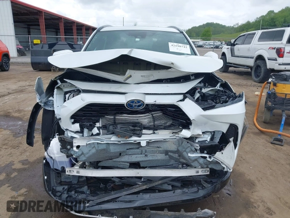 2024 Toyota RAV4 Hybrid SE with VIN 2T3T6RFV3RW066117, listed as a IAAI auction lot 42198742 with 12,352 mi miles and . Bid and sale history available at DreamBid. Image 13.