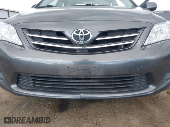 2013 Toyota Corolla L with VIN 2T1BU4EE7DC102626, listed as a IAAI auction lot 42087600 with 84,977 mi miles. Bid and sale history available at carsss.com. Image 6.