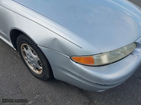 2004 Oldsmobile Alero GX with VIN 1G3NK52F34C106235, listed as a IAAI auction lot 41546490 with 176,045 mi miles. Bid and sale history available at carsss.com. Image 6.