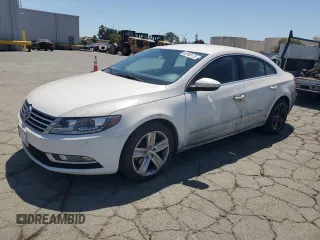 2014 Volkswagen CC R-Line with VIN WVWBP7AN5EE540168, listed as a Copart auction lot 62390175 with 128,087 mi miles and Clean title. Bid and sale history available at DreamBid. Image 1.