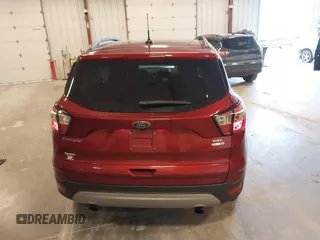 2018 Ford Escape SEL z VIN 1FMCU9HD7JUB52313, wystawiony jako IAAI lot #41901949 z przebiegiem 100 568 mil mil oraz . Historia ofert i sprzedaży dostępna na DreamBid. Obrazek 16.
