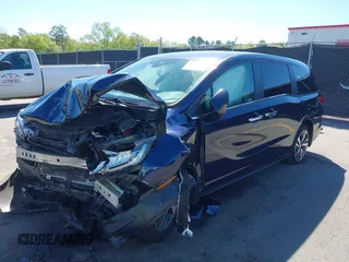 2022 Honda Odyssey Touring z VIN 5FNRL6H86NB013615, wystawiony jako IAAI lot #39139696 z przebiegiem 83 262 mil mil oraz . Historia ofert i sprzedaży dostępna na DreamBid. Obrazek 2.