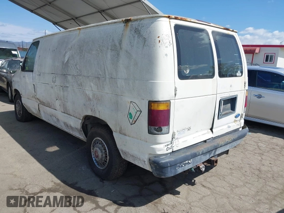 1993 Ford Econoline Cargo with VIN 1FTEE14H6PHB61400, listed as a IAAI auction lot 41889312 with 270,464 mi miles and . Bid and sale history available at DreamBid. Image 3.
