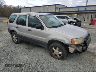 2004 Ford Escape with VIN 1FMCU02144KB63439, listed as a Copart auction lot 85310514 with 275,625 mi miles and Salvage title. Bid and sale history available at DreamBid. Image 4.