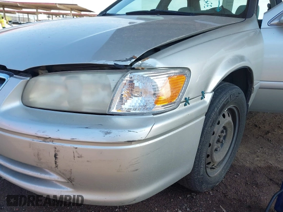 2001 Toyota Camry LE z VIN JT2BF22K710334750, wystawiony jako IAAI lot #42422525 z przebiegiem 273 999 mil mil oraz . Historia ofert i sprzedaży dostępna na DreamBid. Obrazek 11.