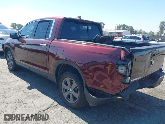 2020 Honda Ridgeline RTL-E with VIN 5FPYK3F7XLB014875, listed as a IAAI auction lot 42620537 with 41,919 mi miles and . Bid and sale history available at DreamBid. Image 3.