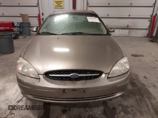 2003 Ford Taurus SES Standard with VIN 1FAFP552X3G184894, listed as a IAAI auction lot 41846677 with 160,824 mi miles. Bid and sale history available at carsss.com. Image 12.