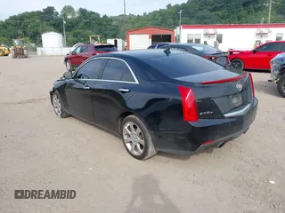 2014 Cadillac ATS Luxury AWD with VIN 1G6AH5RX2E0119821, listed as a IAAI auction lot 42670758 with 157,925 mi miles and . Bid and sale history available at DreamBid. Image 3.