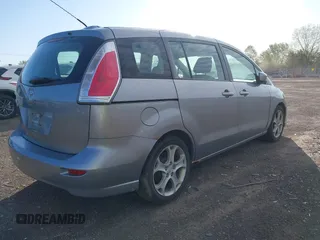 2010 Mazda 5 Sport with VIN JM1CR2W36A0388353, listed as a IAAI auction lot 42121004 with 169,658 mi miles. Bid and sale history available at carsss.com. Image 4.