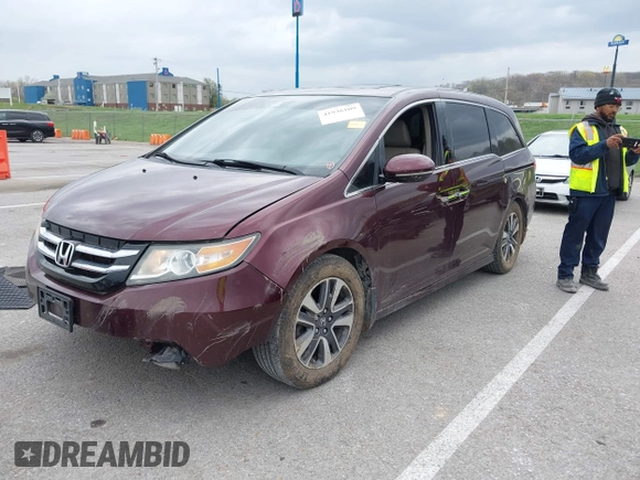 2014 Honda Odyssey Touring with VIN 5FNRL5H94EB127695, listed as a IAAI auction lot 41936109 with 221,786 mi miles and . Bid and sale history available at DreamBid. Image 17.