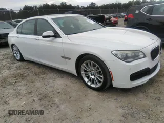 2015 BMW 7 Series 750Li with VIN WBAYE8C50FD781160, listed as a IAAI auction lot 41061232 with 154,496 mi miles. Bid and sale history available at carsss.com. Image 1.