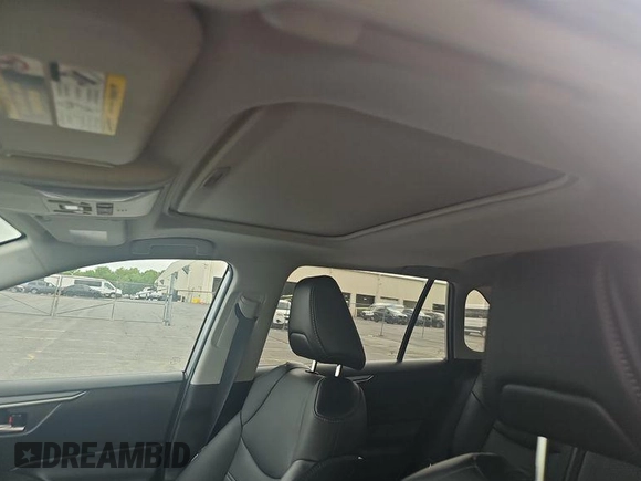 2022 Toyota RAV4 Hybrid XLE Premium with VIN 4T3B6RFV2NU084419, listed as a IAAI auction lot 42729518 with 76,607 mi miles and . Bid and sale history available at DreamBid. Image 3.