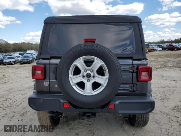 2019 Jeep Wrangler Unlimited Sport S with VIN 1C4HJXDG7KW670905, listed as a Copart auction lot 53114955 with 77,729 mi miles and Salvage title. Bid and sale history available at DreamBid. Image 6.