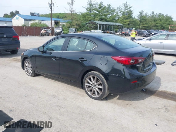 2017 Mazda 3 Touring z VIN 3MZBN1V74HM133565, wystawiony jako IAAI lot #42160836 z przebiegiem 104 997 mil mil oraz . Historia ofert i sprzedaży dostępna na DreamBid. Obrazek 3.