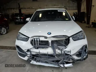 2020 BMW X1 xDrive28i z VIN WBXJG9C00L5P42487, wystawiony jako Copart lot #59669325 z przebiegiem 88 402 mil mil oraz Szkoda całkowita • Salvage title. Historia ofert i sprzedaży dostępna na DreamBid. Obrazek 5.