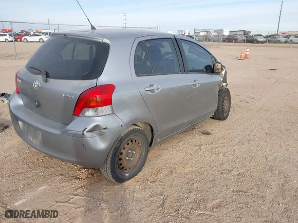 2010 Toyota Yaris with VIN JTDKT4K39A5316113, listed as a IAAI auction lot 41090164 with 163,661 mi miles. Bid and sale history available at carsss.com. Image 4.