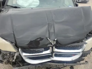 2013 Dodge Grand Caravan SXT with VIN 2C4RDGCG9DR618975, listed as a Copart auction lot 51378005 with 145,373 mi miles and Salvage Title. Bid and sale history available at DreamBid. Image 13.