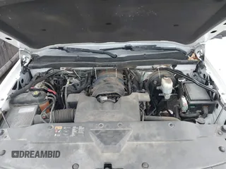 2015 Chevrolet Silverado 1500 LT with VIN 1GCNKRECXFZ414527, listed as a IAAI auction lot 41024683 with 219,673 mi miles. Bid and sale history available at carsss.com. Image 10.