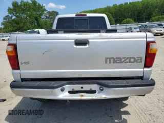 2002 Mazda B-Series Truck DS z VIN 4F4YR16U72TM03068, wystawiony jako Copart lot #55536395 z przebiegiem 199 895 mil mil oraz Czysty tytuł • Clean title. Historia ofert i sprzedaży dostępna na DreamBid. Obrazek 6.