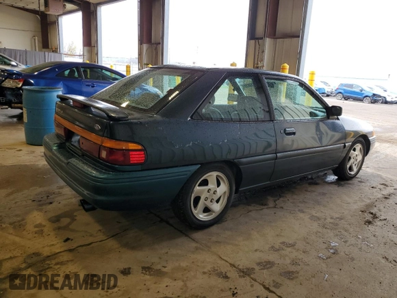 1996 Ford Escort z VIN 1FASP11J0TW123967, wystawiony jako Copart lot #52859835 z przebiegiem 164 693 mil mil oraz Szkoda całkowita • Salvage title. Historia ofert i sprzedaży dostępna na DreamBid. Obrazek 3.