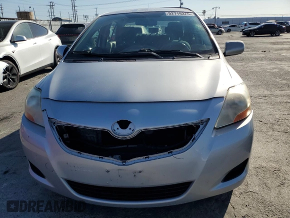 2009 Toyota Yaris with VIN JTDBT903891347503, listed as a Copart auction lot 52719375 with 134,931 mi miles and Salvage Title. Bid and sale history available at carsss.com. Image 5.