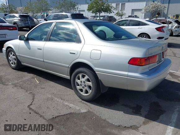 2001 Toyota Camry LE z VIN JT2BF22KX10342454, wystawiony jako IAAI lot #41939743 z przebiegiem 124 045 mil mil oraz . Historia ofert i sprzedaży dostępna na DreamBid. Obrazek 3.