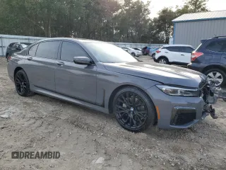 2020 BMW 7 Series 740i with VIN WBA7T2C06LCD15613, listed as a Copart auction lot 42206705 with 76,520 mi miles and Salvage Title. Bid and sale history available at carsss.com. Image 4.