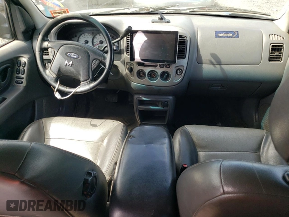 2003 Ford Escape XLT Popular 2 with VIN 1FMYU93133KB35168, listed as a Copart auction lot 57303335 with 197,368 mi miles and Salvage title. Bid and sale history available at DreamBid. Image 8.