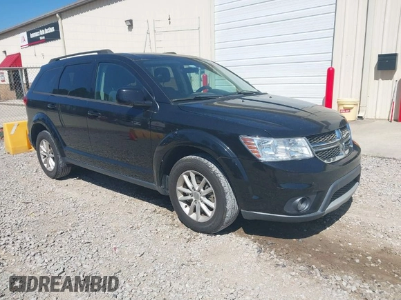 2015 Dodge Journey SXT with VIN 3C4PDCBG2FT560953, listed as a IAAI auction lot 42053264 with 127,463 mi miles and . Bid and sale history available at DreamBid. Image 1.