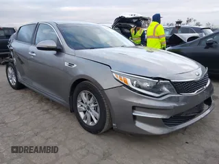 2018 Kia Optima LX z VIN 5XXGT4L3XJG218434, wystawiony jako IAAI lot #42045384 z przebiegiem 127 317 mil mil oraz . Historia ofert i sprzedaży dostępna na DreamBid. Obrazek 1.