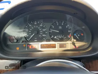 2003 BMW 3 Series 325i with VIN WBAEV33433KL87253, listed as a Copart auction lot 50985995 with 141,663 mi miles and Salvage Title. Bid and sale history available at carsss.com. Image 9.